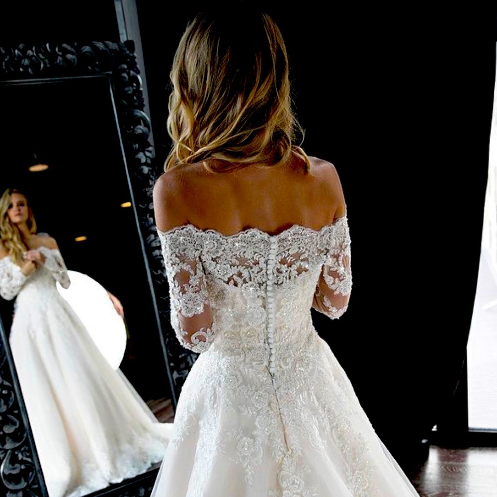 Romantic off shoulder, long sleeve ivory lace and satin Bridal gown. Never worn!